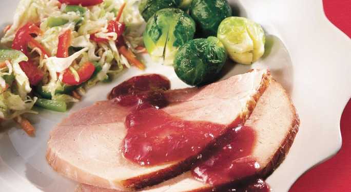 BAKED HAM WITH CRANBERRY HONEY SAUCE