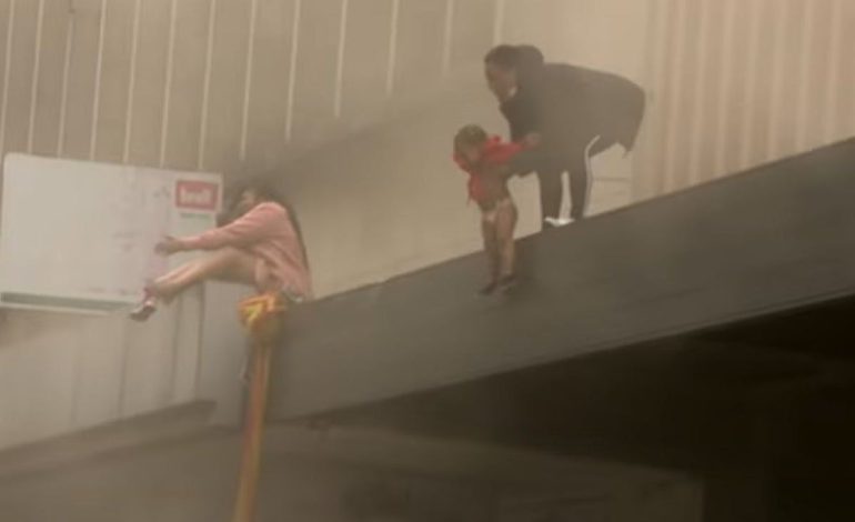 South African mum forced to throw child off building amidst riots