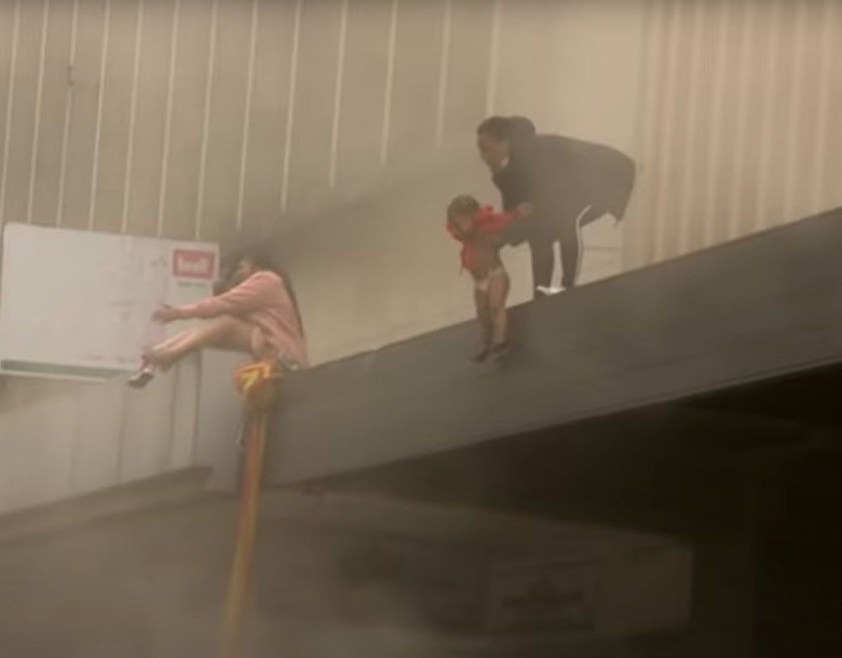 South African mum forced to throw child off building amidst riots