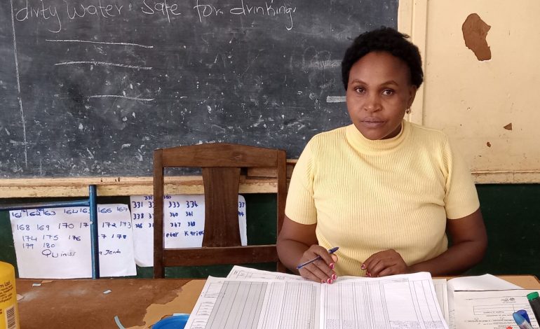 A teacher scaling her academic ladder amid reports of a high ECDE attendance rate among learners